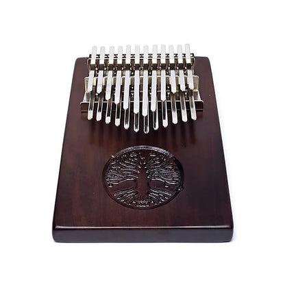 Kalimba/ Hluru ou 'piano a doigt' ! 24 notes, fait en bois de noyer d'Amérque. Vendu avec micro. Décoré d'un Arbre de vie sculpté. Livré avec un sac en tissu et un marteau d'accordage !