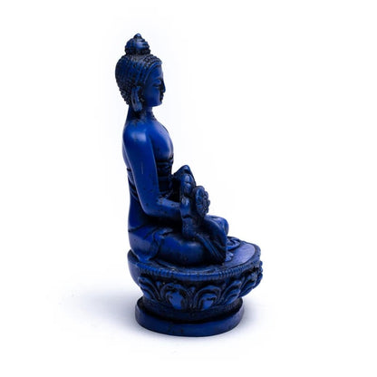 Bouddha 'Medecine', belle statuette de plâtre de couleur bleu sombre, avec les attributs typiques de ce Bouddha. 11 centimètres de hauteur - 195 grammes. Ultra résistant, parfait au milieu de lapis lazuli !