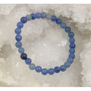 Aventurine bleue, perles rondes de 6 ou 8 mm. Vendu en fil de perle 38/39 cm, en bracelet de 17 à 21cm, en collier de 45 ou sautoir de 60cm. Qualité AA à AAA, superbes perles !