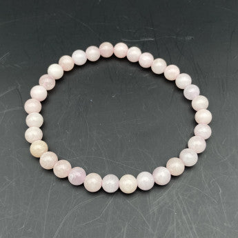 Morganite, perles rondes de 6 et 8 mm, vendu en fil de perle 38/39 cm, en bracelet de 17 à 21cm, en collier de 45 ou sautoir de 60cm. Qualité AA à AAA, superbes perles bleutées !