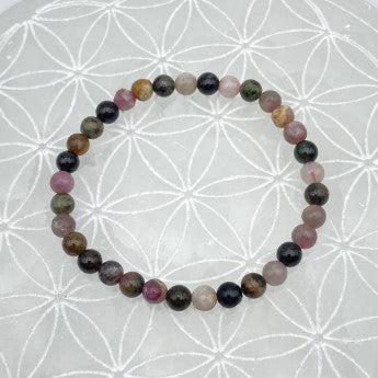 Tourmaline Multicolore, perles rondes de 4, 6 ou 8 mm. Vendu en fil de perle 38/39 cm, en bracelet de 17 à 21cm, en collier de 45 ou sautoir de 60cm. Qualité AA à AAA, superbes perles aux couleurs naturelles hypnotisantes !