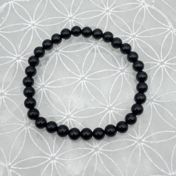 Tourmaline noire, perles rondes de 4, 6, 8 ou 10 mm. Vendu en fil de perle 38/39 cm, en bracelet de 17 à 21cm, en collier de 45 ou sautoir de 60cm. Qualité AA à AAA, superbes perles, lourdes mais puissantes !