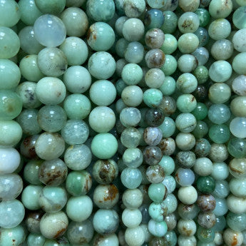 Chrysoprase, perles rondes de 6 et 8 mm, vendu en : fil de perle 38/39 cm, en bracelet de 17 à 21cm, en collier de 45 ou sautoir de 60cm. Qualité AA à AAA, superbes perles, parfait !