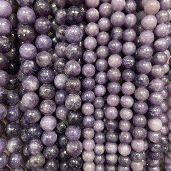 Lépidolite, perles rondes de 6 et 8 mm, vendu en : fil de perle 38/39 cm, en bracelet de 17 à 21cm, en collier de 45 ou sautoir de 60cm. Qualité AA à AAA, superbes perles naturelles !