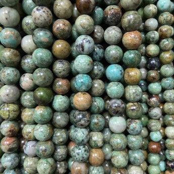 Turquoise du Pérou, perles rondes de 6 ou 8 mm. Vendu en fil de perle 38/39 cm, en bracelet de 17 à 21cm, en collier de 45 ou sautoir de 60cm. Qualité A, mais très belles perles naturelles !