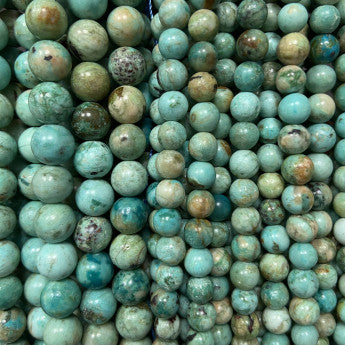 Turquoise de qualité Extra du Pérou, perles rondes de 6 et 8 mm, vendu en fil de perle 38/39 cm, en bracelet de 17 à 21cm, en collier de 45 ou sautoir de 60cm. Qualité AA à AAA, parfait !